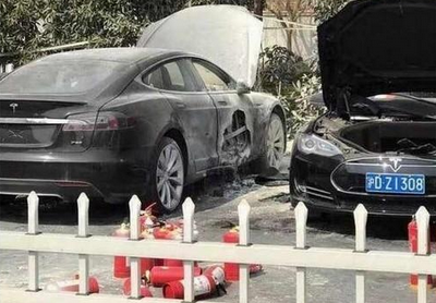 TESLA_ON_FIRE_AGAIN_AT_SUPERCHARGER_STATION_Elon_Musk_Corruption_And_Crappy_Engineering_Make_Tesla_Cars_So_Unsafe_.png